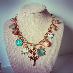 Gold Charm Necklace with Green and White Accents